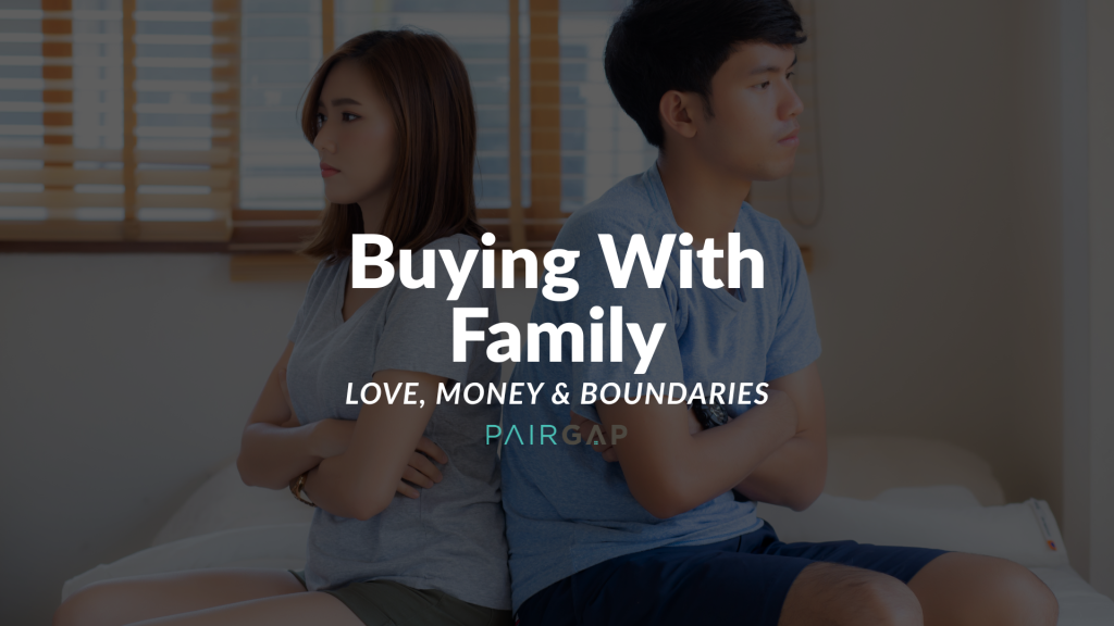 A couple sitting back-to-back on a bed with arms crossed, expressing emotional strain in family-based co-ownership decisions.