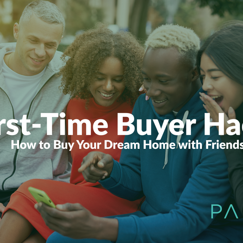 A group of four diverse friends smiling and looking at a smartphone together, representing the joy and collaboration of co-buying a home.