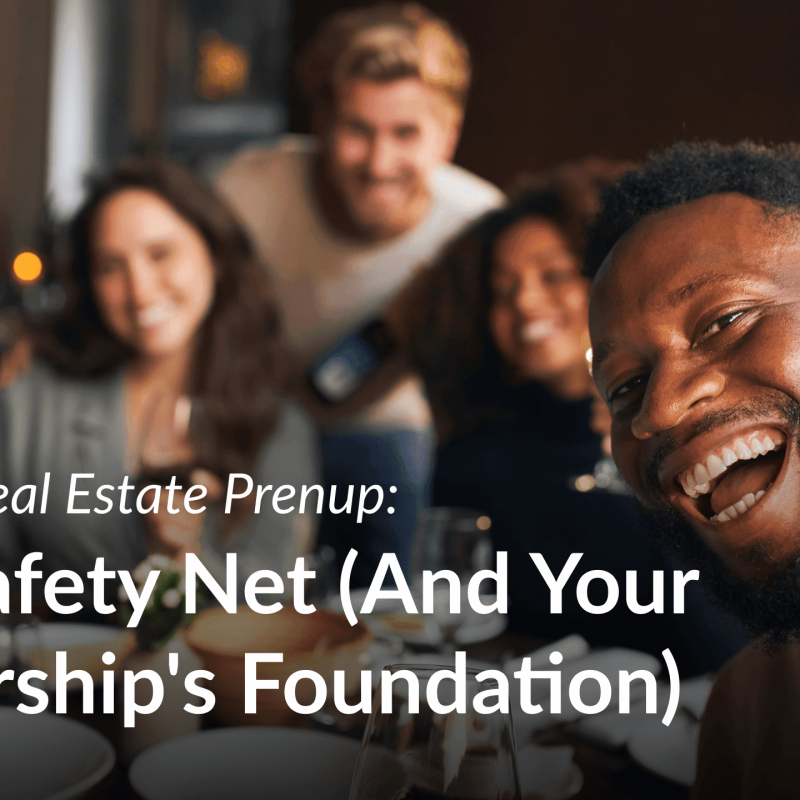 A smiling man takes a selfie at a dinner table with a diverse group of friends in the background, alongside the Pairgap logo and text promoting Pairgap’s Real Estate Prenup.