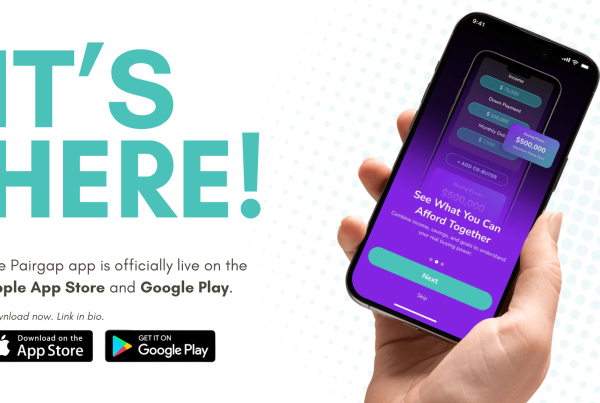 Hand holding a smartphone displaying the Pairgap Co-Buying Power Calculator app, now live on the Apple App Store and Google Play.